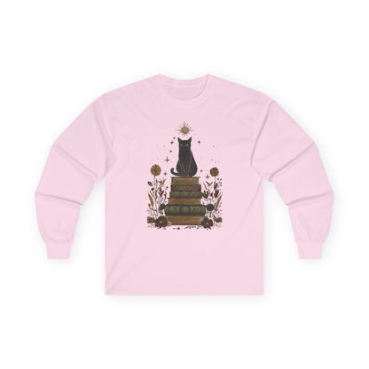 Mystic Cat & Books Long Sleeve featuring a celestial black cat perched on a vintage book stack, ideal gift for book lovers.