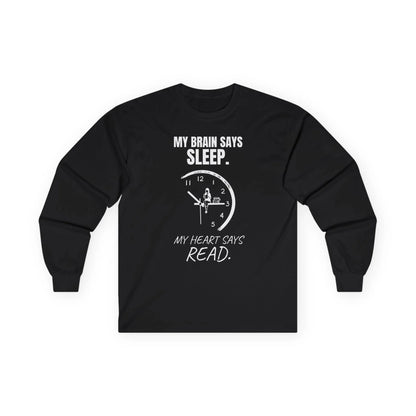 Brain vs. Books Long Sleeve with clock graphic and text: 'My brain says sleep. My heart says read.' Perfect for cozy nights and book lovers.