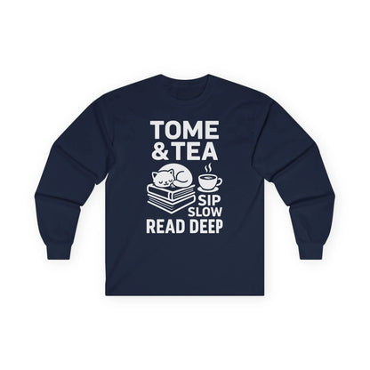 Navy long sleeve shirt featuring a cat on books and the text 'Tome & Tea. Sip Slow. Read Deep.' Perfect for book lovers.