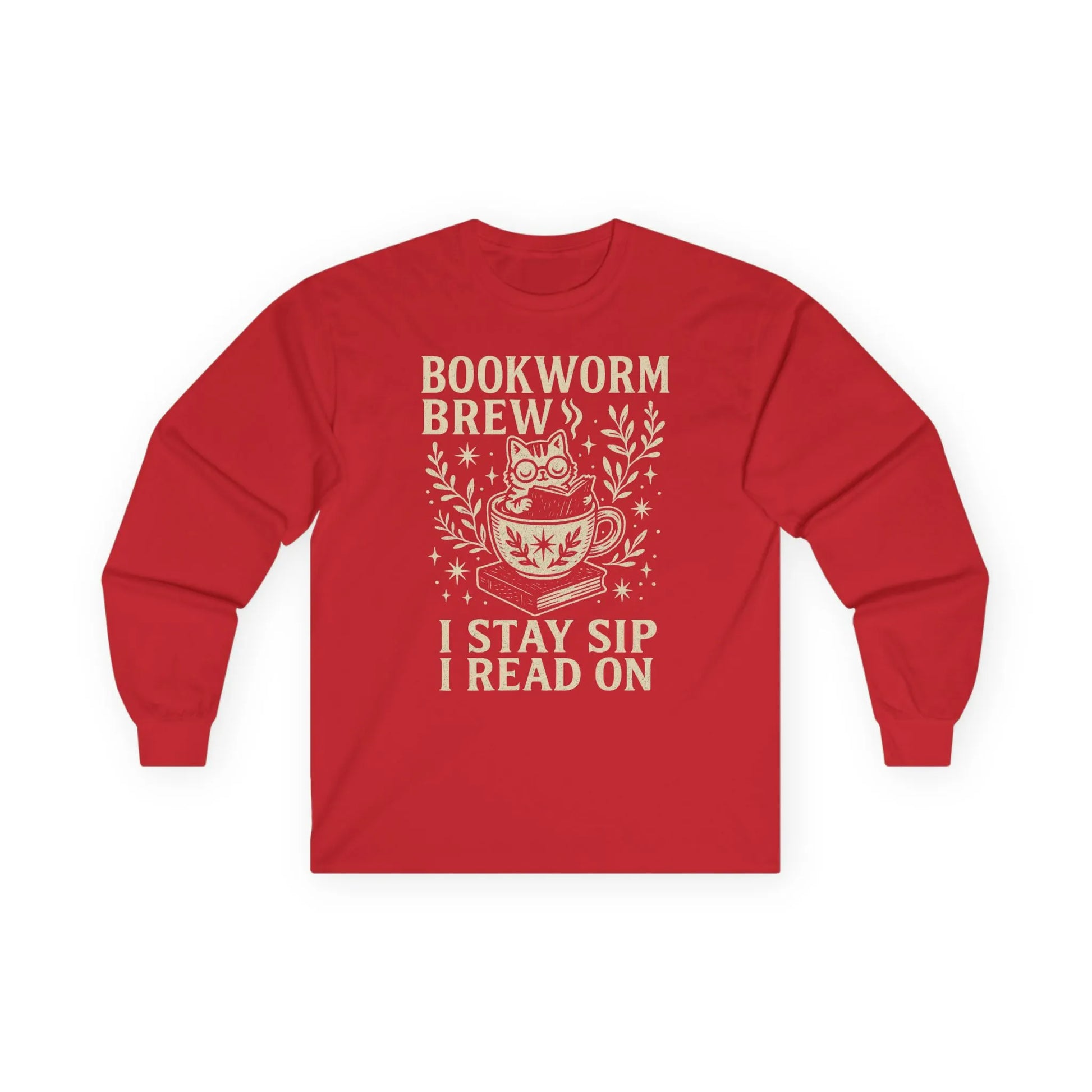 Cozy red long sleeve t-shirt featuring a cat in a cup with ‘Bookworm Brew’ and ‘I stay sip, I read on’ text. Perfect for book lovers.