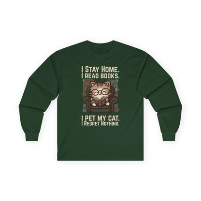 Library Cat Reader Long Sleeve featuring a cute cat in glasses on a cozy chair with book-related humor, perfect for book lovers.