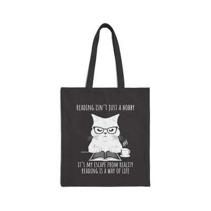 Reading Way of Life Tote Bag with a cat graphic and text, perfect for book lovers. Durable canvas material.