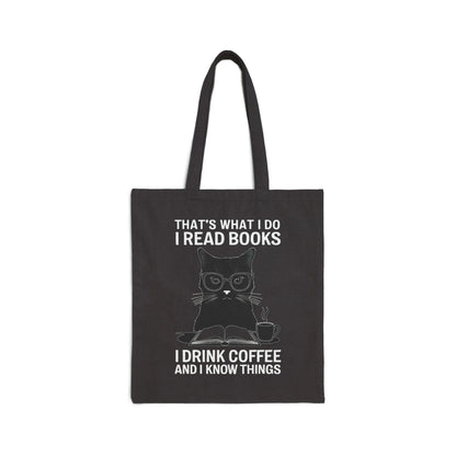 Coffee & Cat Wisdom Tote Bag featuring a witty cat illustration with glasses and text: "That's what I do, I read books, I drink coffee and I know things".