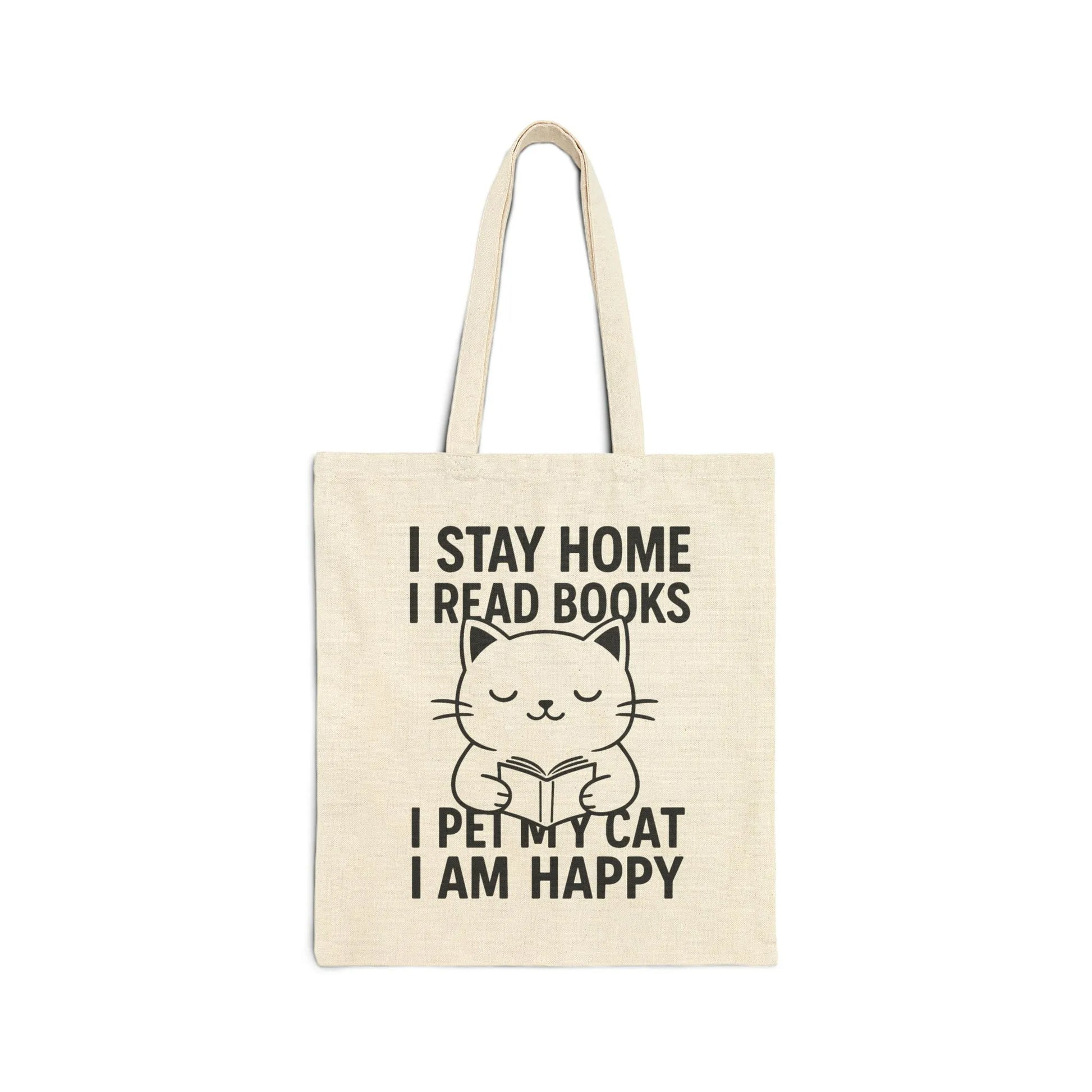 Happy Cat Reader Tote Bag featuring a cute cat reading with text: 'I stay home, I read books, I pet my cat, I am happy.' Perfect for cozy moments.