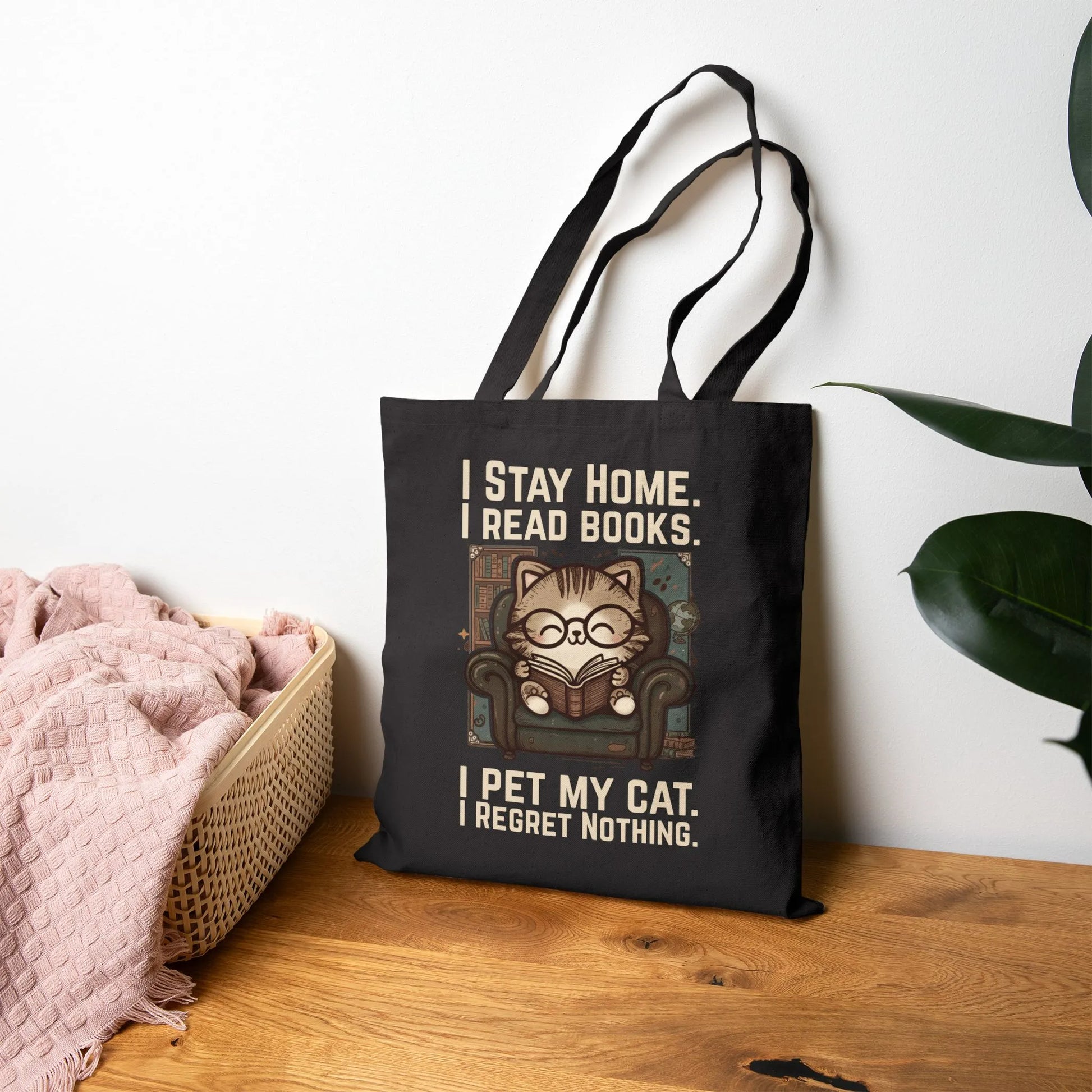 Library Cat Reader Tote Bag with a cute cat design and book lover quote on a stylish black background.