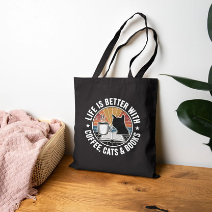 Sunset Reads & Whiskers Tote Bag featuring a cat, coffee cup, and sunset, perfect for book lovers and gifts for readers.