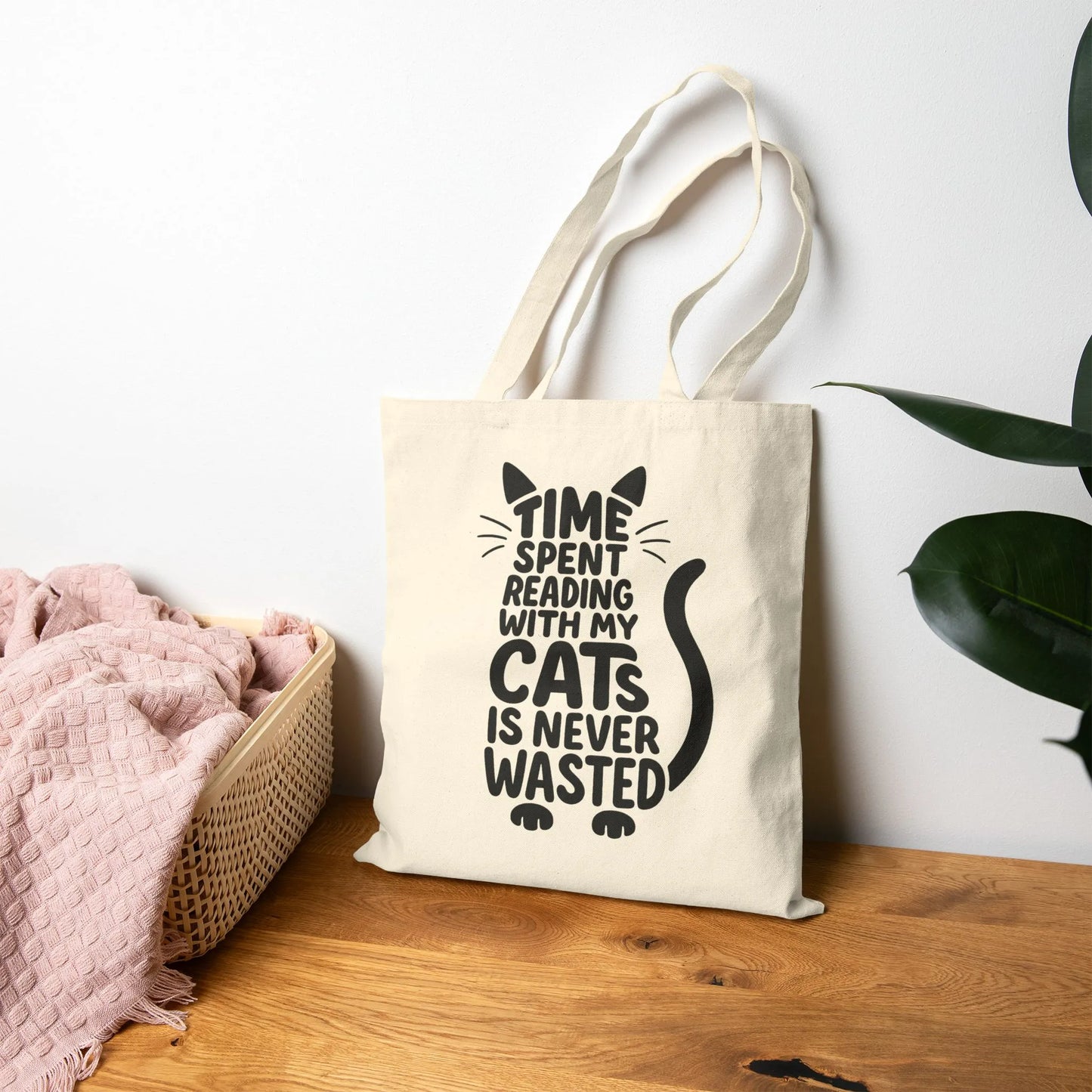 Never Wasted with Cats Tote Bag featuring playful cat typography and the phrase 'TIME SPENT READING WITH MY CATS IS NEVER WASTED.'