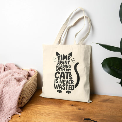 Never Wasted with Cats Tote Bag featuring playful cat typography and the phrase 'TIME SPENT READING WITH MY CATS IS NEVER WASTED.'