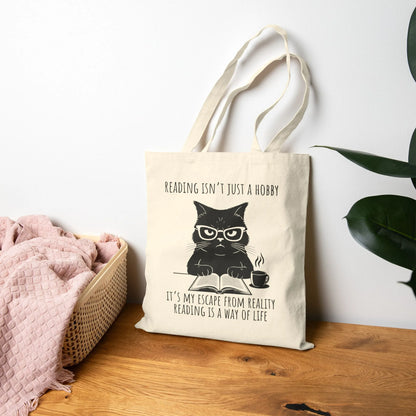 Reading Way of Life Tote Bag showcasing a funny book design with cat illustration, perfect gifts for book lovers.
