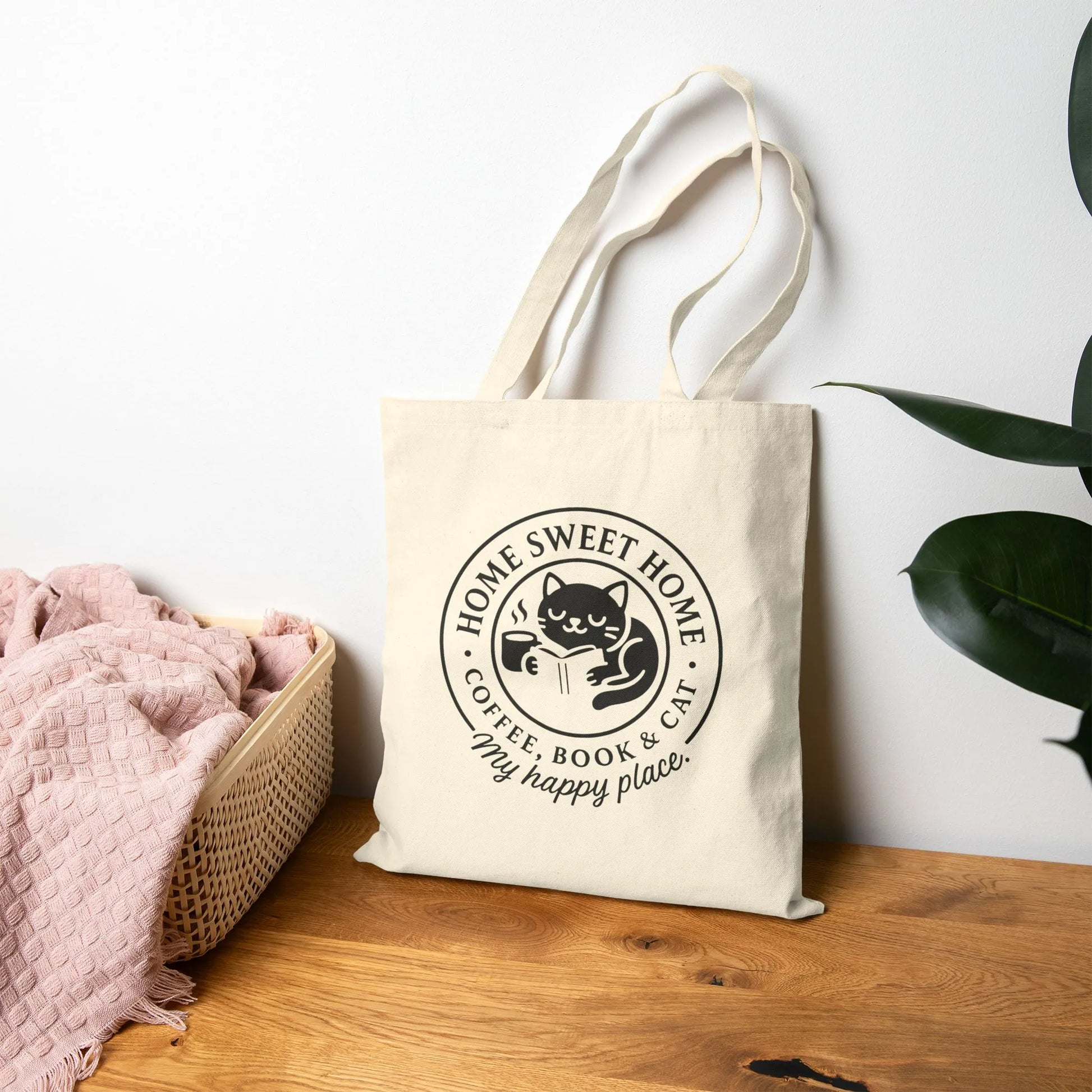 Cozy Cat Haven Tote Bag featuring a cute cat illustration, perfect for cat lovers and bookworms who cherish cozy vibes.
