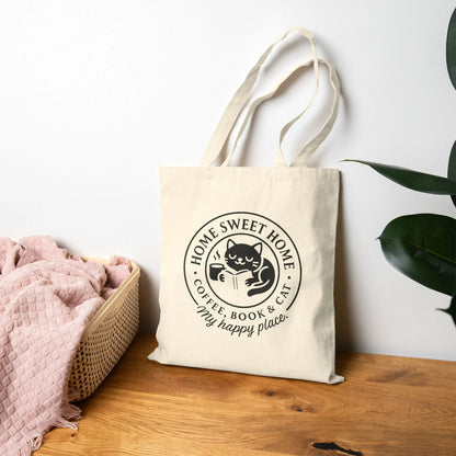 Cozy Cat Haven Tote Bag featuring a cute cat illustration, perfect for cat lovers and bookworms who cherish cozy vibes.