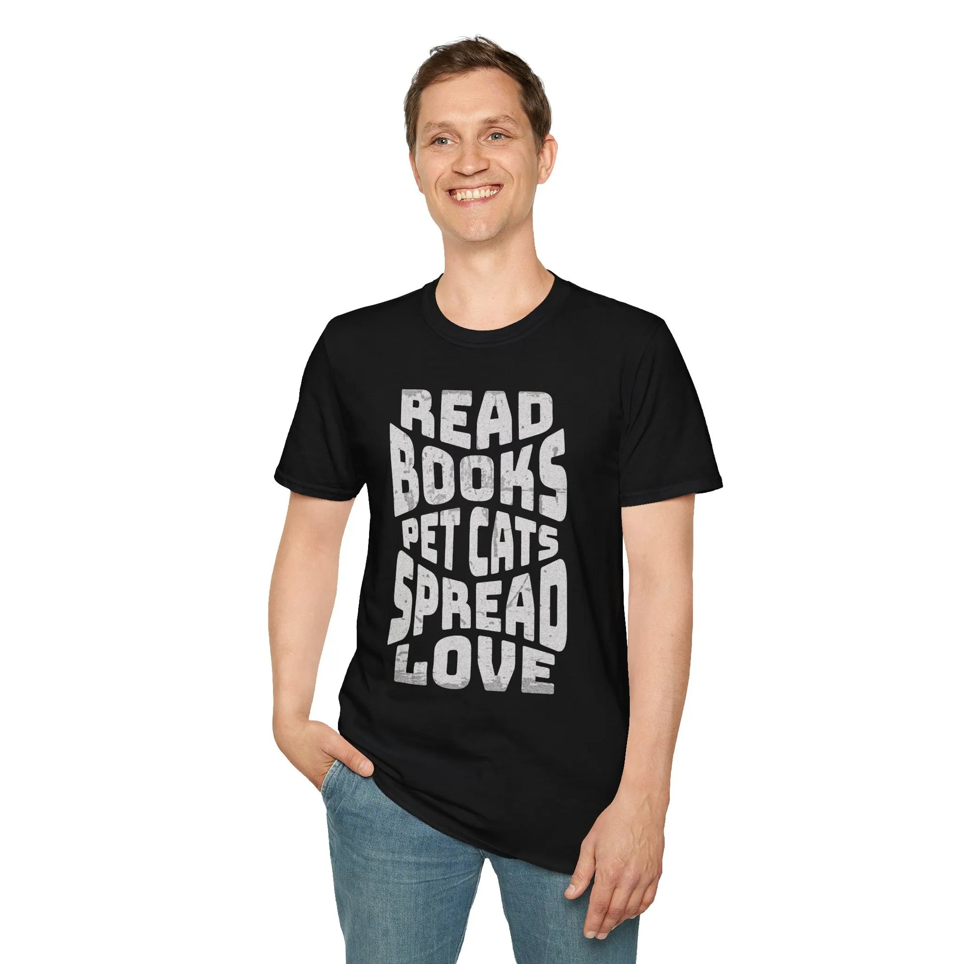 Man wearing Spread Bookish Love T-Shirt with bold text: 'READ BOOKS PET CATS SPREAD LOVE.' Perfect gift for book lovers!