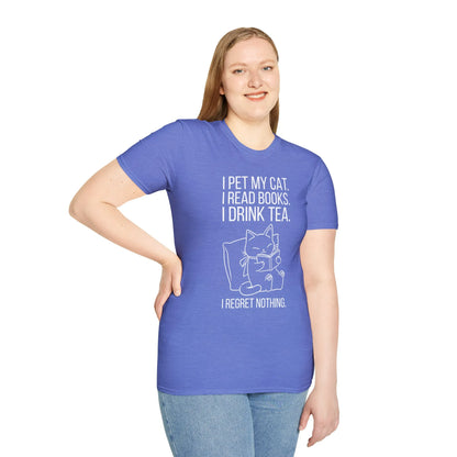 Cozy home scene with a woman in a book lover shirt, relaxed with her cat, surrounded by books and tea, embracing her reading lifestyle.