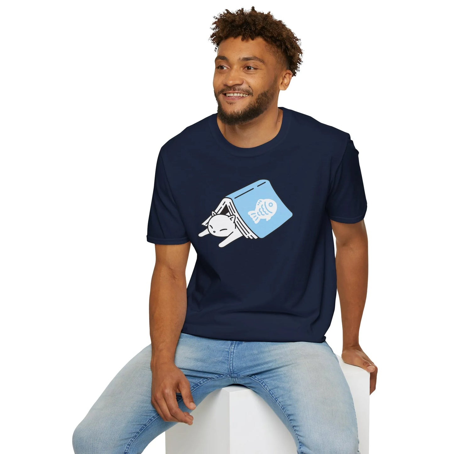 Cozy navy book lover shirt featuring a sleepy cat peeking from an open book, perfect for readers and cat enthusiasts alike!