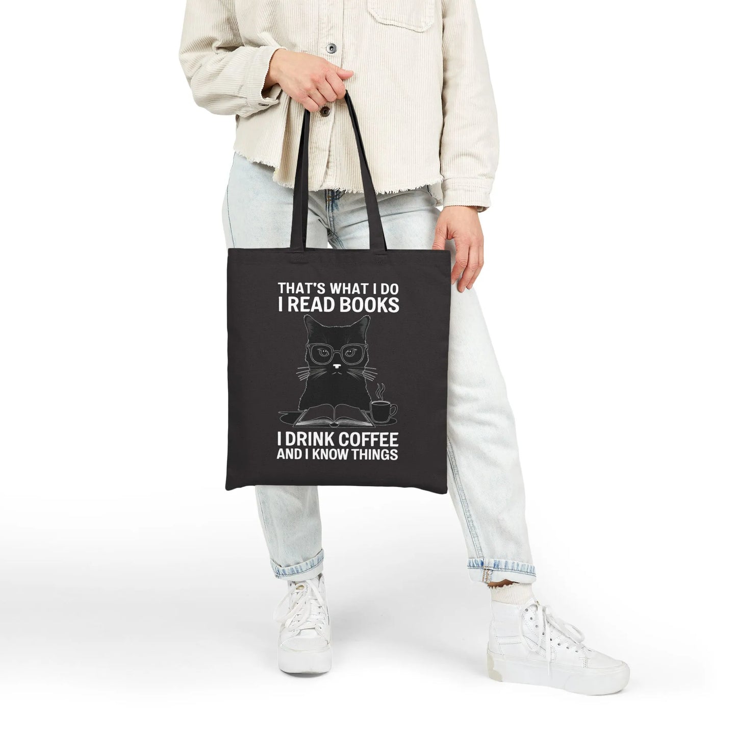 Coffee & Cat Wisdom Tote Bag featuring a witty cat illustration with the text: "That's what I do I read books I drink coffee and I know things."