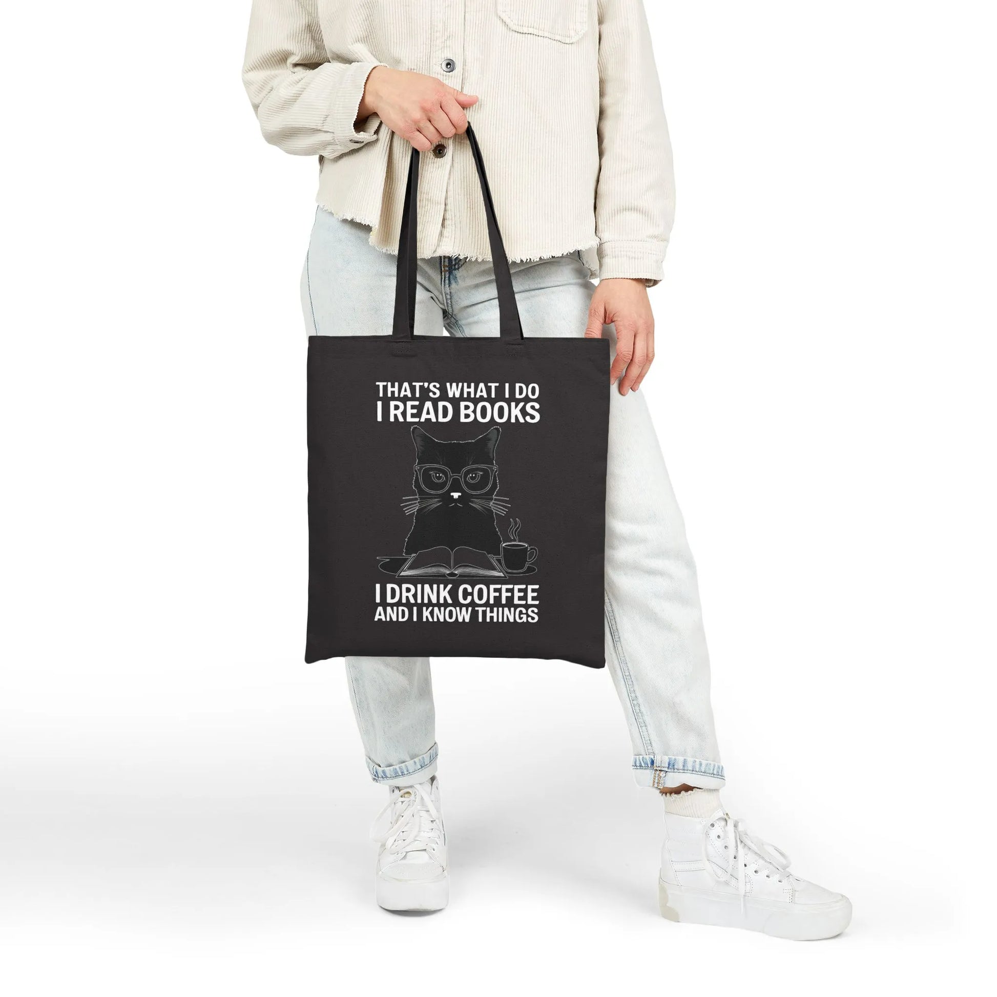 Coffee & Cat Wisdom Tote Bag featuring a witty cat illustration with the text: "That's what I do I read books I drink coffee and I know things."