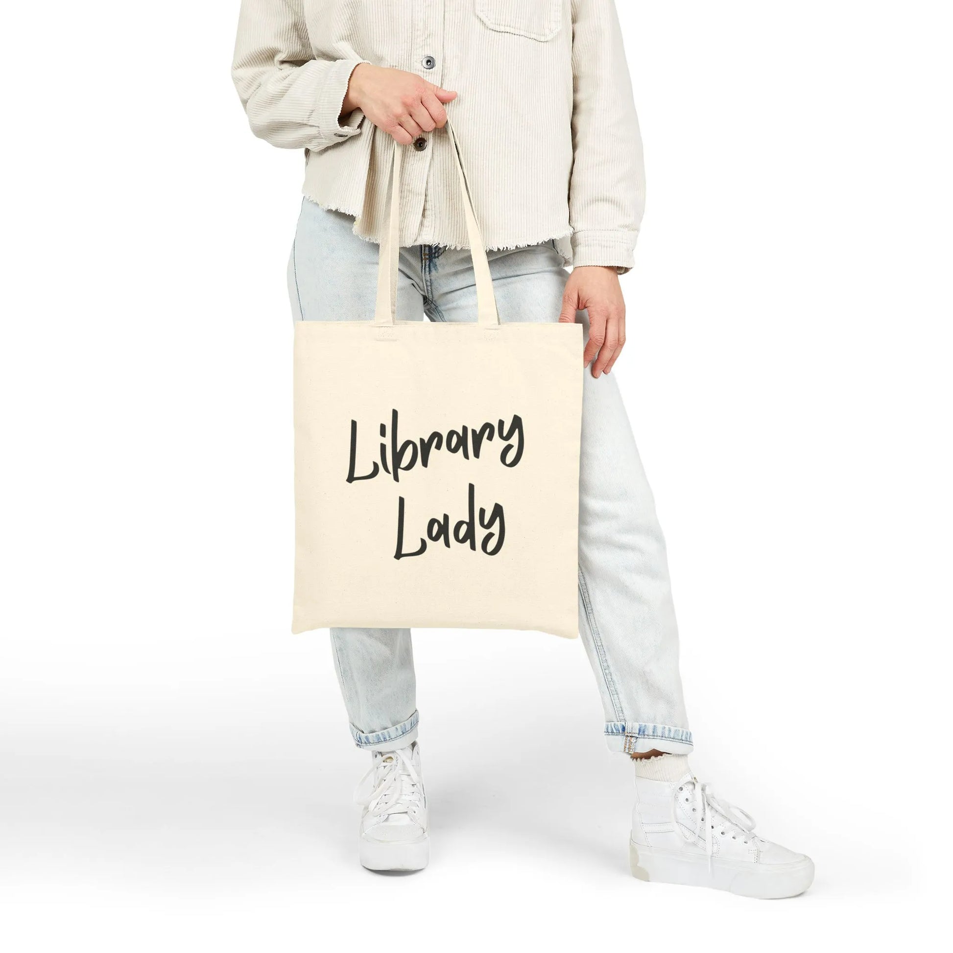 Library Lady Tote Bag featuring charming handwritten typography, perfect for book lovers carrying books and daily essentials.