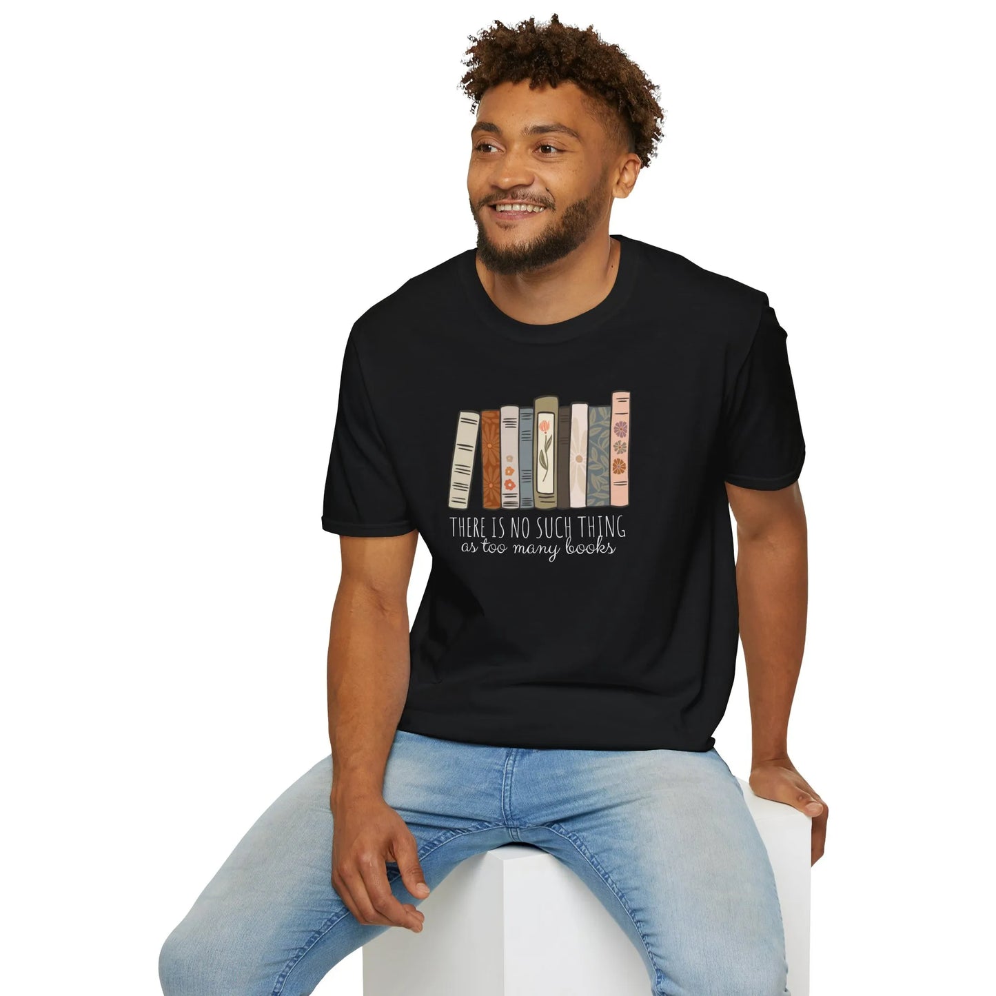 A relaxed fit unisex Too Many Books T-Shirt in organic cotton, perfect for book lovers, featuring colorful illustrated spines 📖.