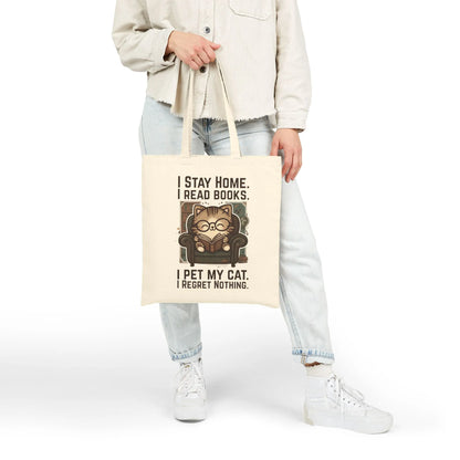 Library Cat Reader Tote Bag featuring a cozy cat reading with sayings about books and staying home.