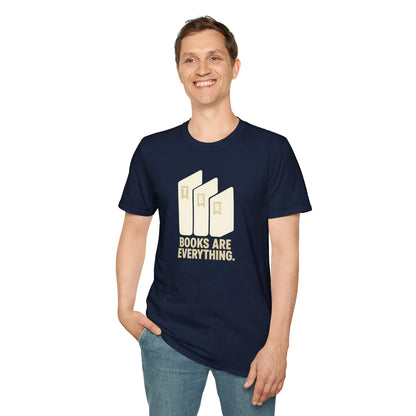 Book lover enjoying a cozy reading moment in a relaxed fit t-shirt, perfect for gifts for book lovers, surrounded by books and inspiration.