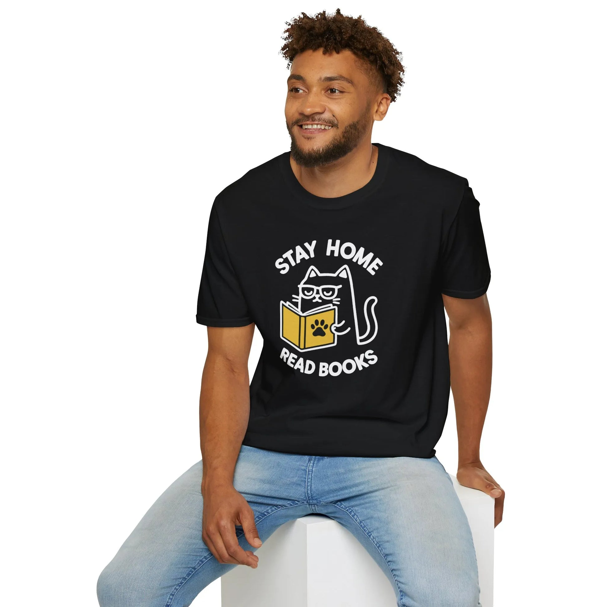 Cozy black cat reading shirt with 'Stay Home, Read Books' in playful text, perfect for book lovers and cat fans.