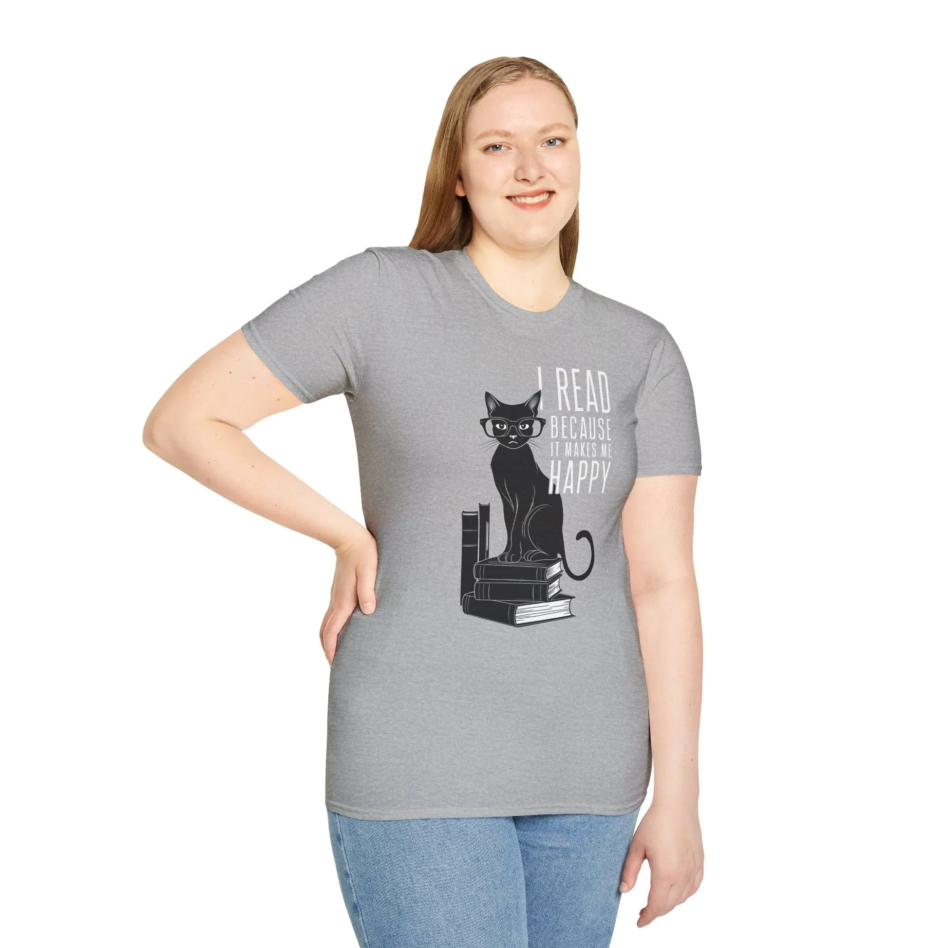 Funny reading tee featuring a cat atop books with the text: 'I read because it makes me happy.' Perfect for cozy book lovers.