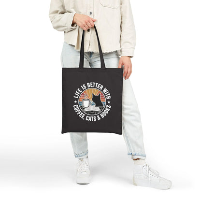 Sunset Reads & Whiskers Tote Bag with cat, coffee, and books illustration; perfect gift for book lovers and cat enthusiasts.