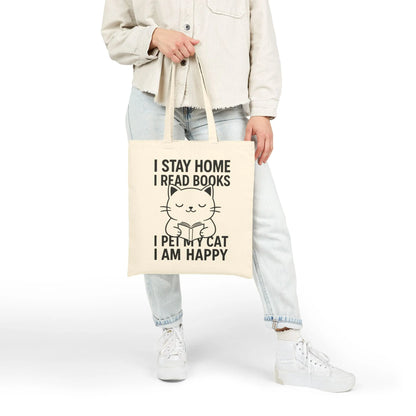 Happy Cat Reader Tote Bag featuring a cute kitty illustration and the text: 'I STAY HOME I READ BOOKS I PET MY CAT I AM HAPPY'.