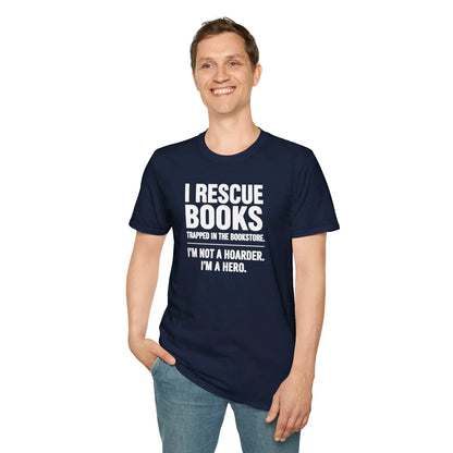 Smiling person in relaxed fit Not a Hoarder T-Shirt, surrounded by books in cozy reading nook, perfect for book lovers.