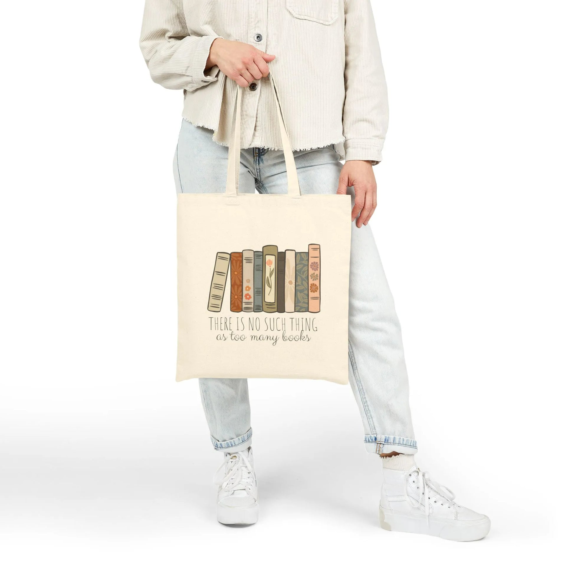 Too Many Books Tote Bag featuring colorful book designs on durable cotton canvas, perfect for book lovers.