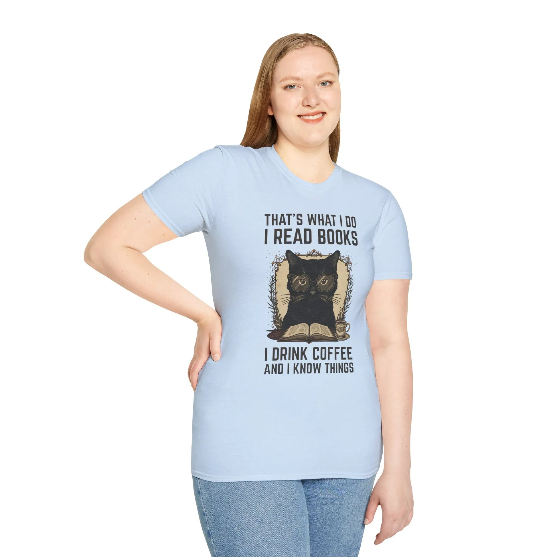 Coffee Cat Reader T-Shirt featuring a black cat in glasses with text: 'That’s what I do — I read books, I drink coffee and I know things.'