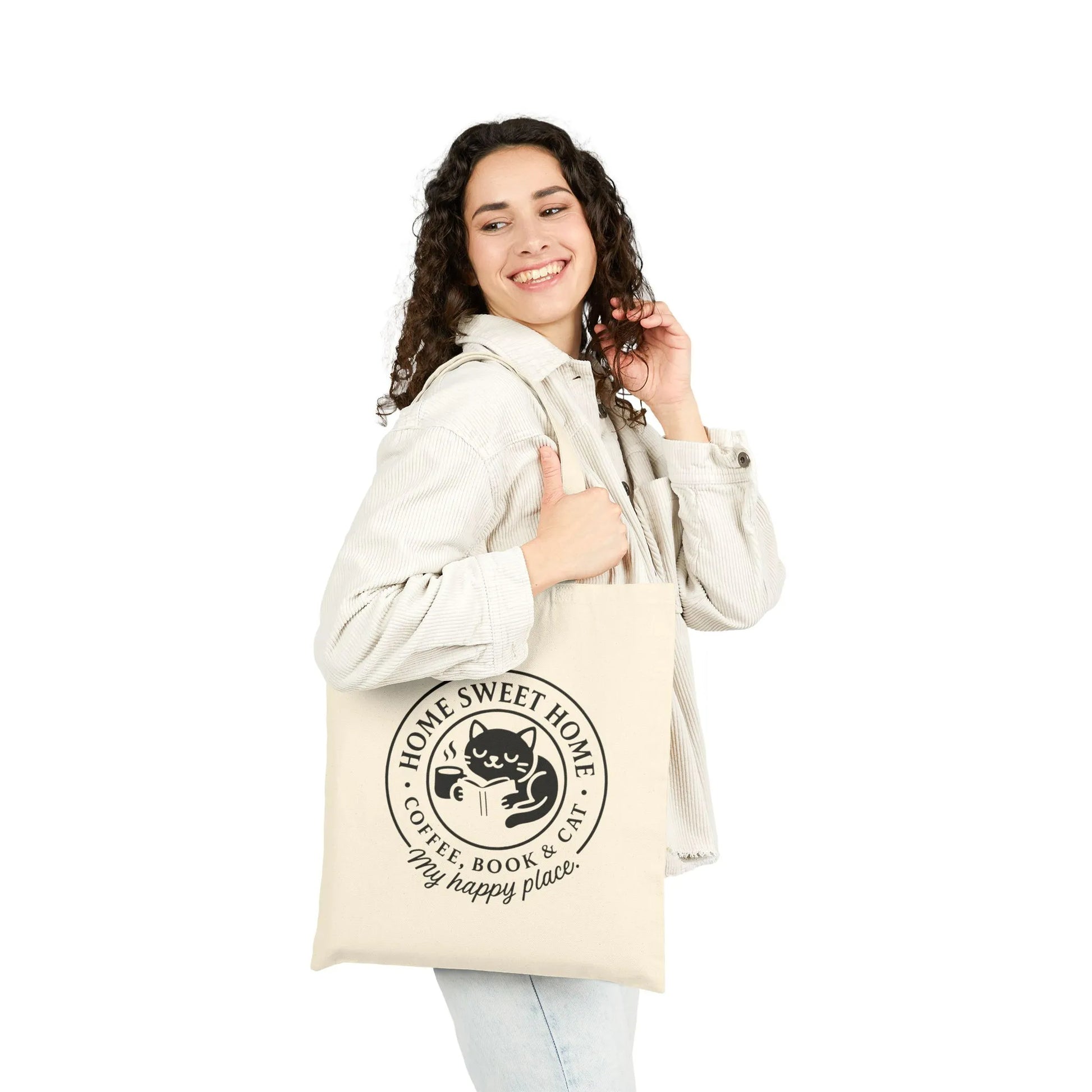 Cozy Cat Haven Tote Bag featuring a cheerful cat illustration with the text 'Home Sweet Home - Coffee, Book & Cat' for book lovers.