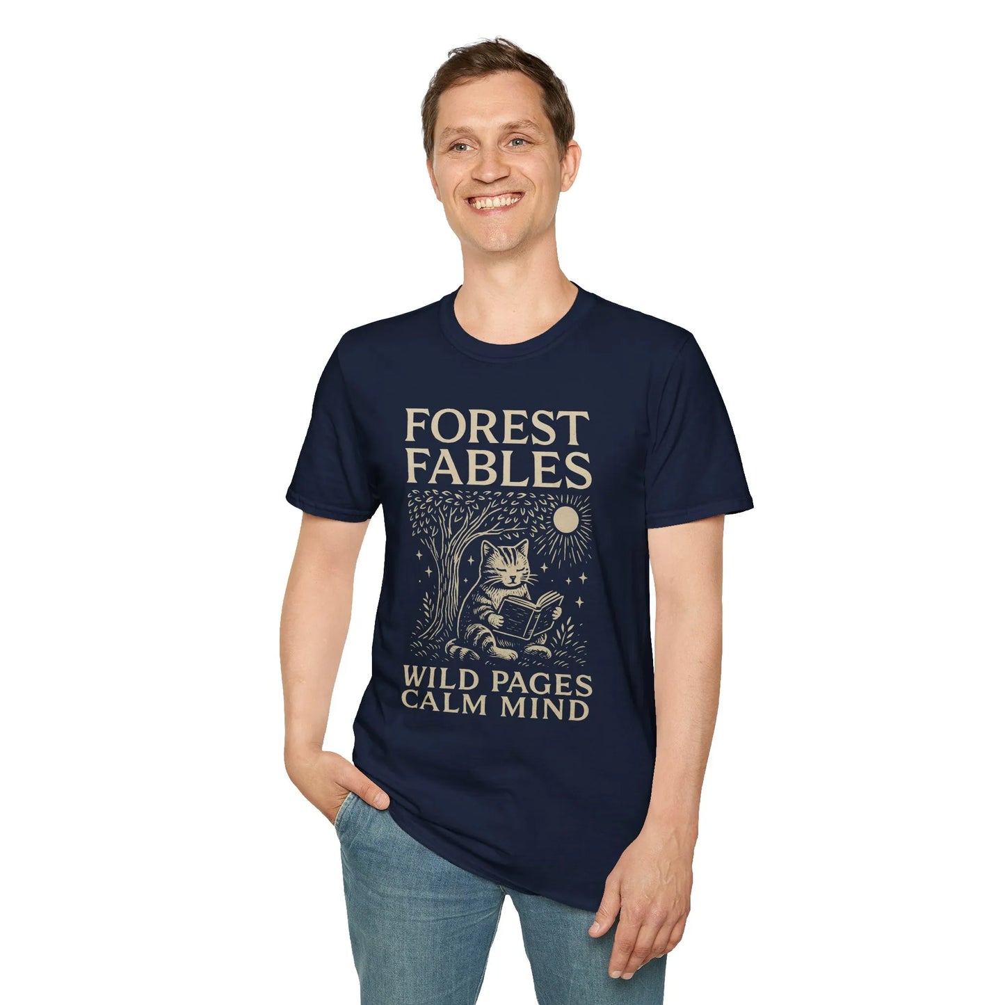 Man wearing a Forest Fables T-Shirt showcasing a whimsical cat reading under a tree, perfect for book lovers and gifts.
