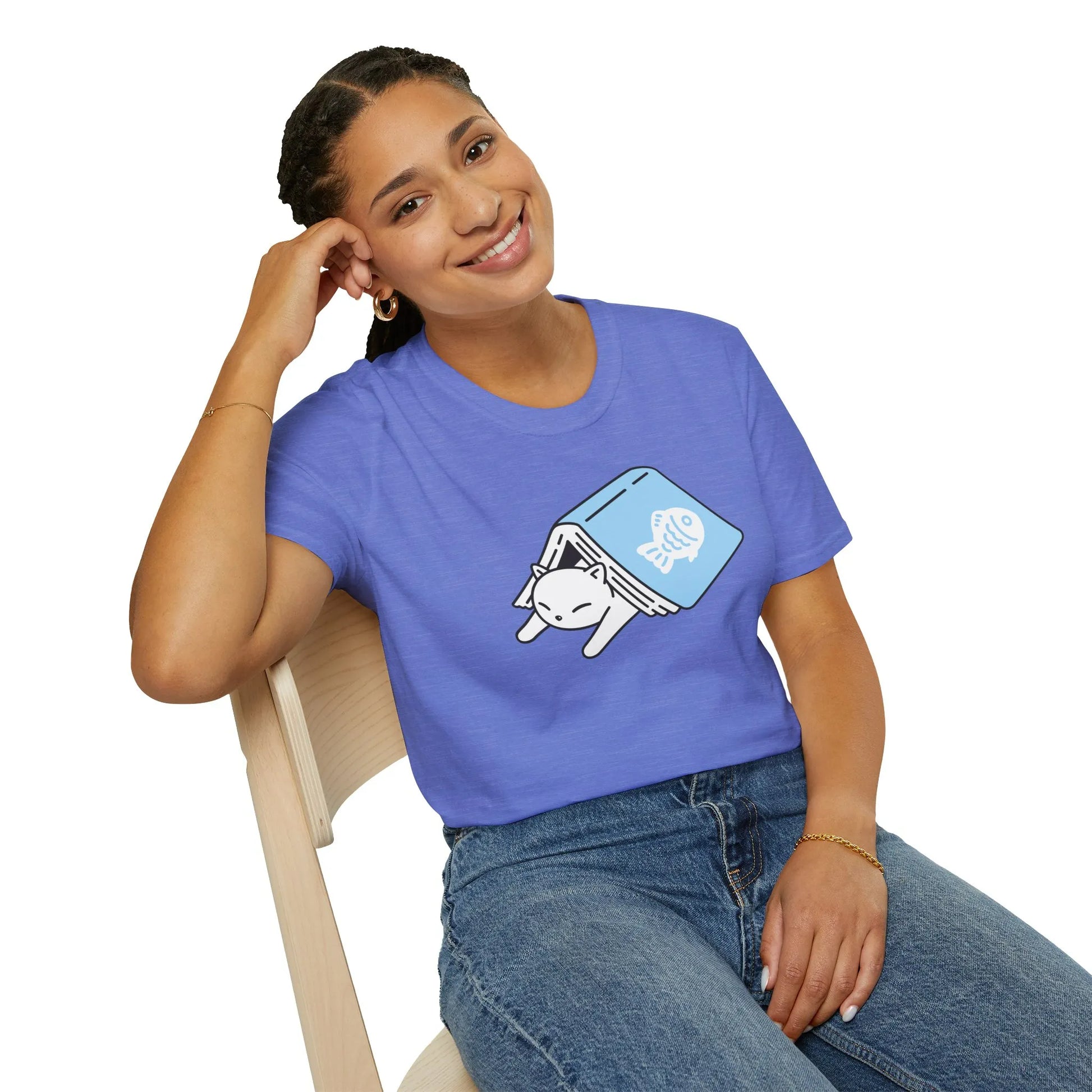Cozy blue t-shirt featuring a sleepy cat peeking from a book. Perfect gift for book lovers and cat enthusiasts.