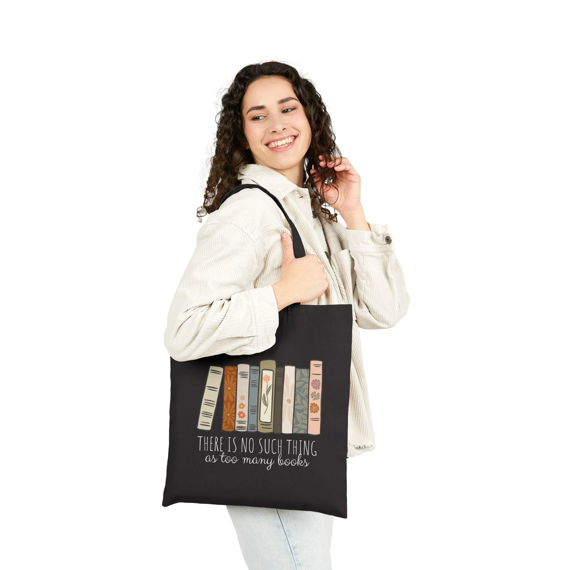 Too Many Books Tote Bag featuring colorful book spines design, durable black canvas, perfect for book lovers.
