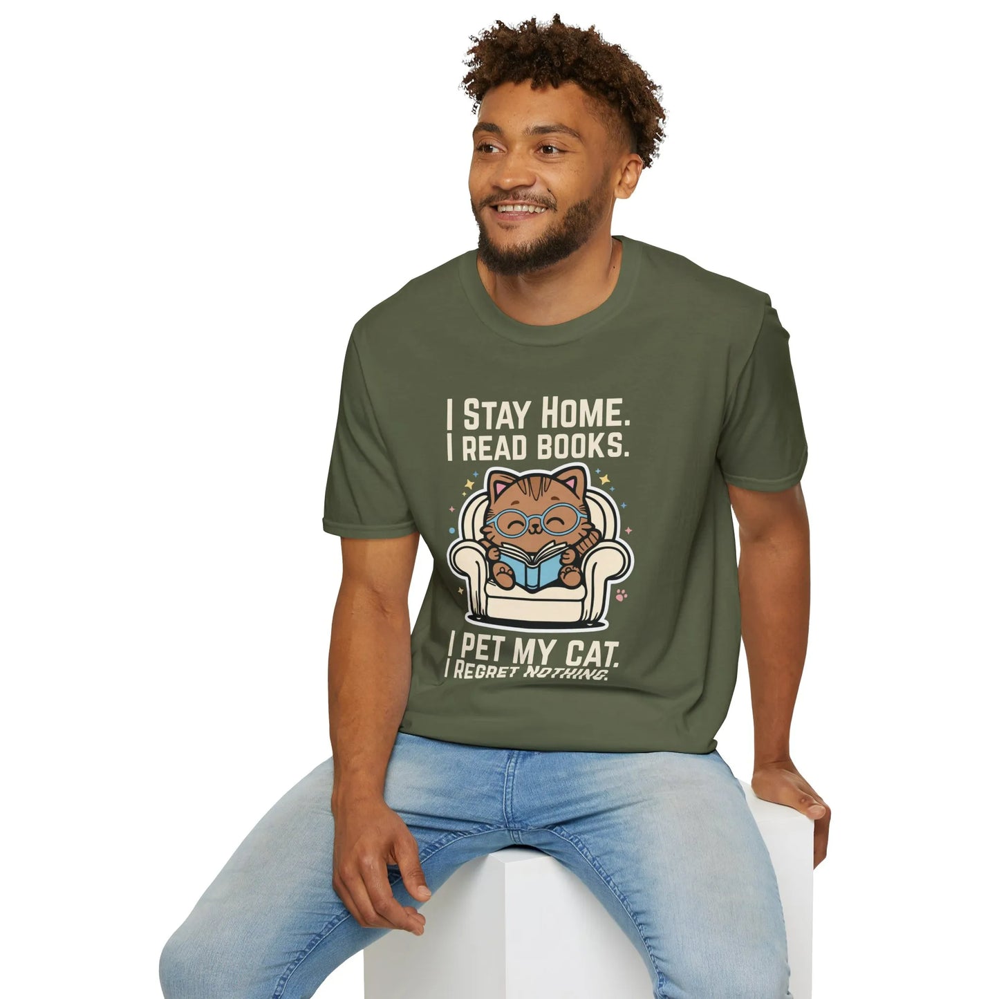 A man wearing the Starry Cat Reader T-Shirt featuring a cat reading a book with the text "I Stay Home. I Read Books. I Pet My Cat. I Regret Nothing."
