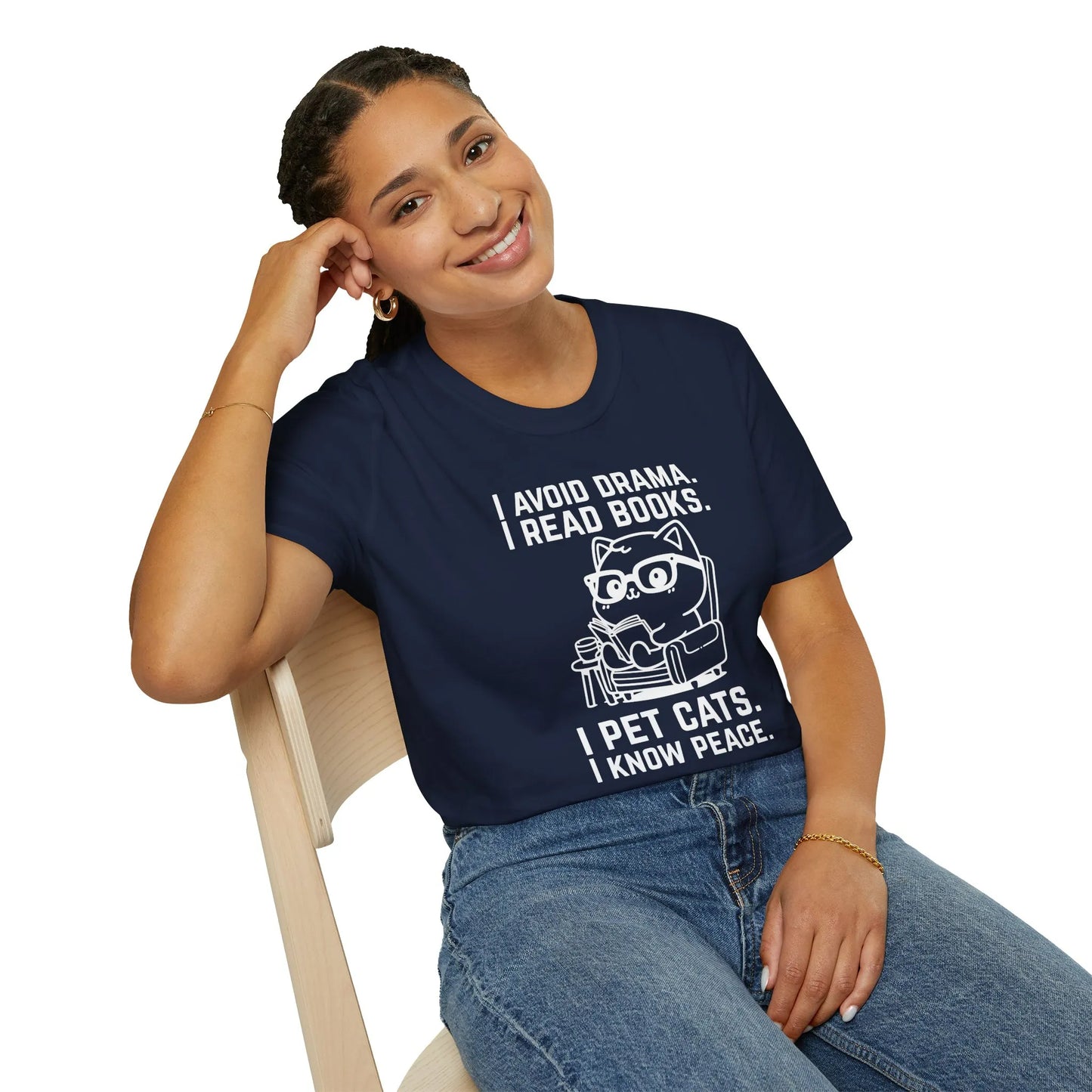 Funny reading tee featuring a cat and books with text: 'I avoid drama, I read books. I pet cats, I know peace.' Perfect gift for book lovers.