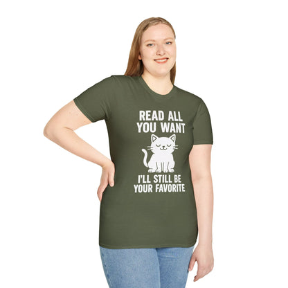 Funny 'Read All You Want, I'll Still Be Your Favorite' cat shirt, cozy tee for book lovers and cat enthusiasts.
