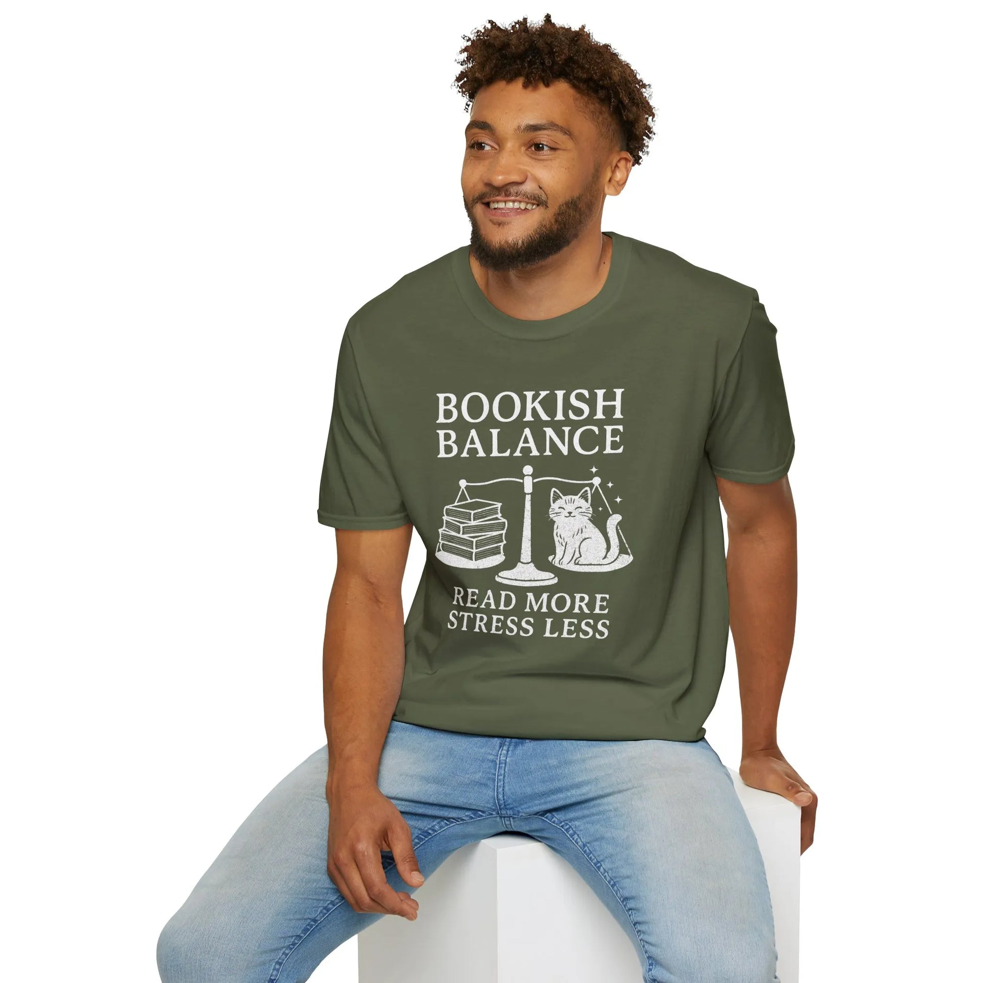 Bookish Balance t-shirt featuring a cat and books, reminding readers to read more and stress less. Perfect gift for book lovers!