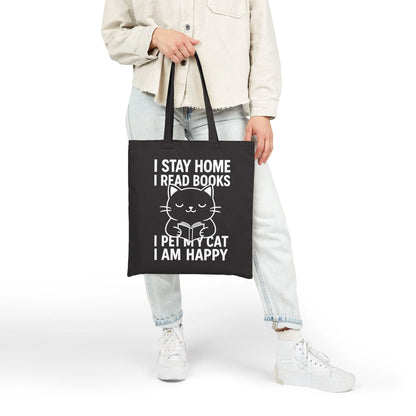 Happy Cat Reader Tote Bag with a cute cat illustration and text: 'I STAY HOME I READ BOOKS I PET MY CAT I AM HAPPY.' Perfect for book lovers!