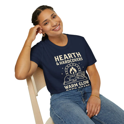 Cozy Hearth & Hardcovers T-shirt featuring a cat by a fire, perfect for book lovers and a witty gift for readers.