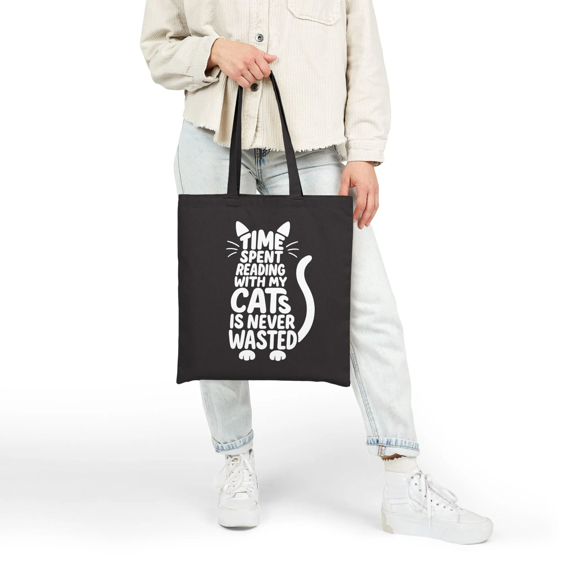 Never Wasted with Cats Tote Bag features playful typography and a cat silhouette, perfect for book lovers who adore felines.