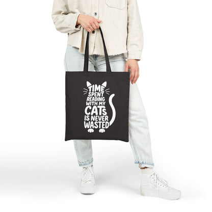 Never Wasted with Cats Tote Bag features playful typography and a cat silhouette, perfect for book lovers who adore felines.