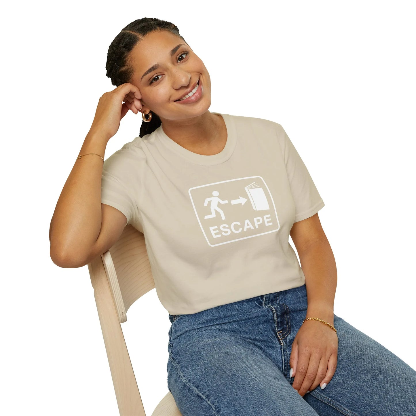 A smiling woman in a cozy beige 'Escape' tee, featuring an illustration of a person exiting. Perfect for book lovers and witty readers.
