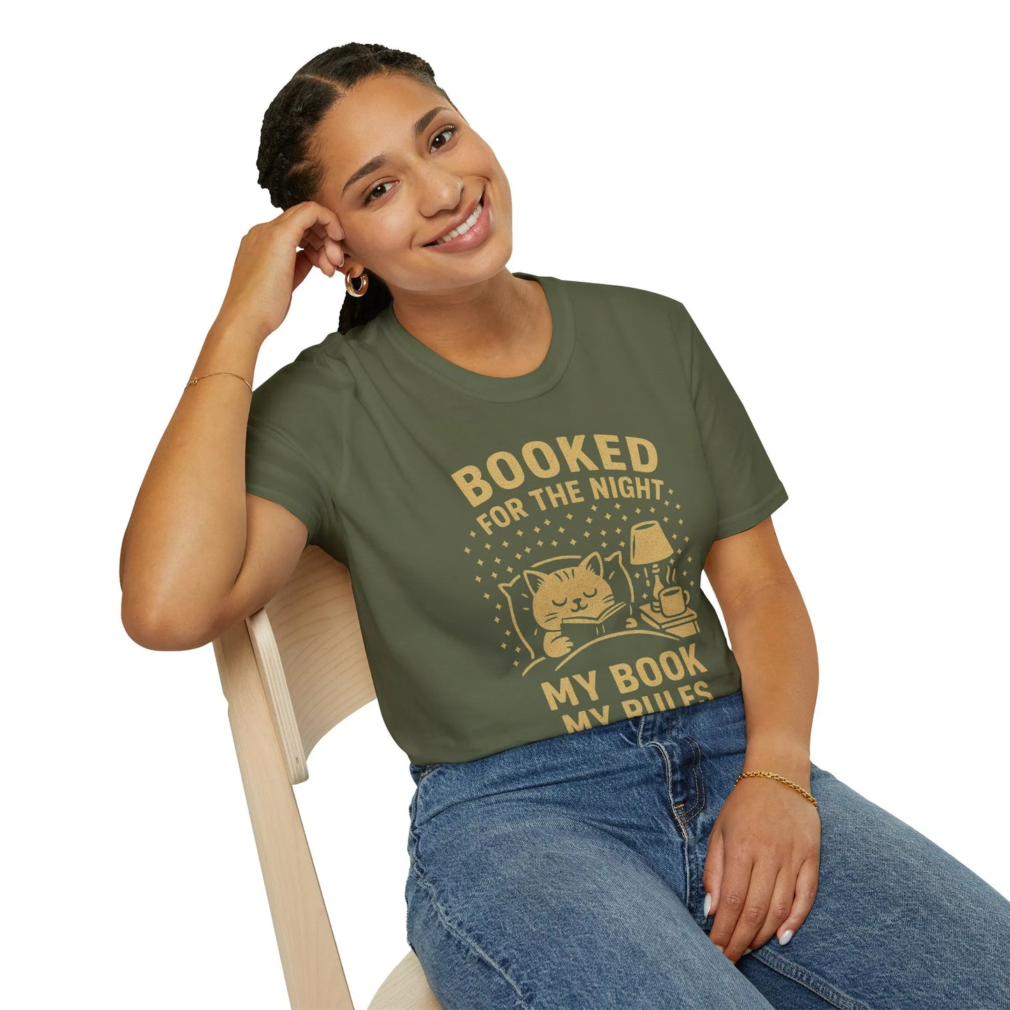 Cozy cat in bed design on 'Booked for the Night' tee, perfect for book lovers and gifts for readers.