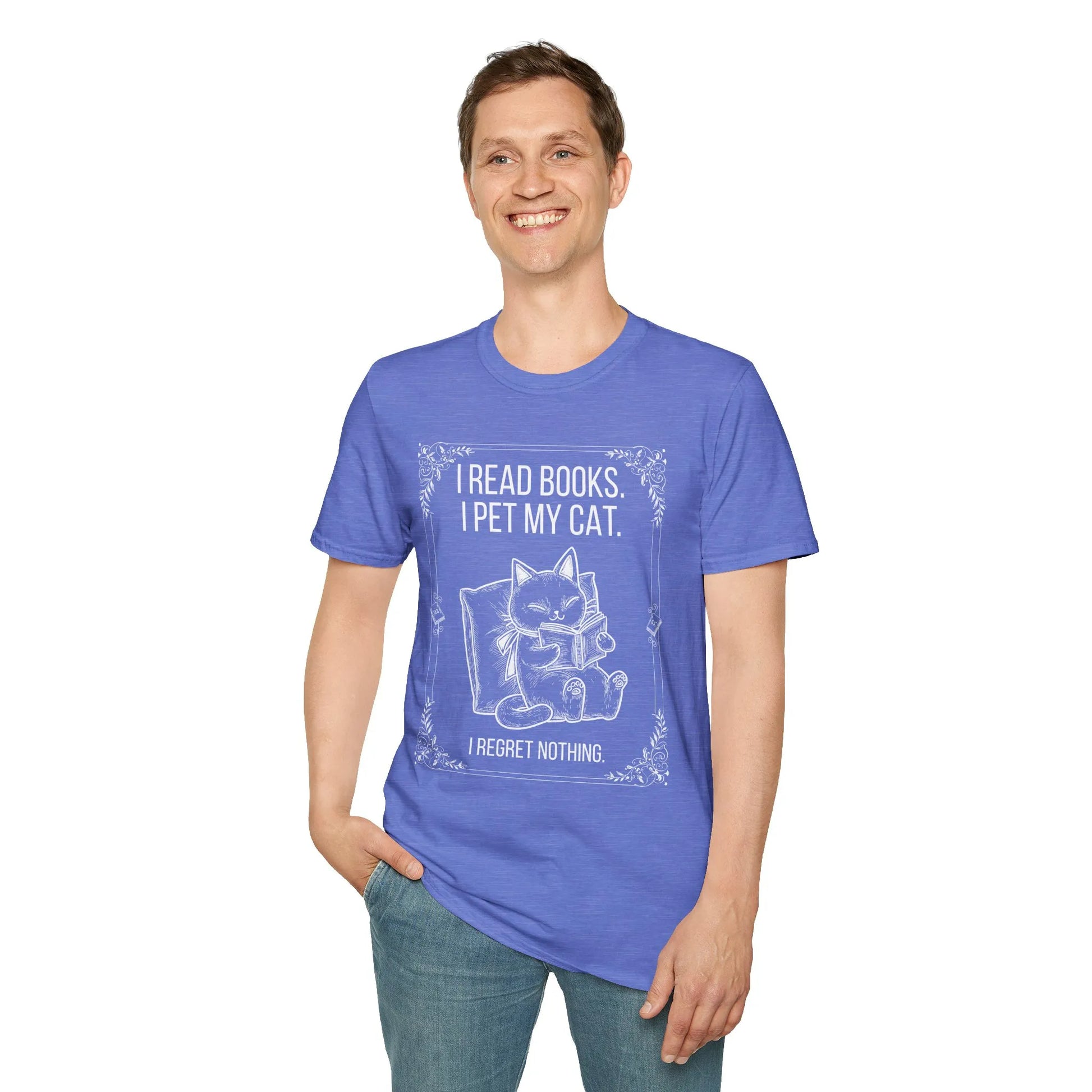A smiling person wearing a blue 'Read. Pet. No Regrets. T-Shirt' featuring a cozy black cat reading a book illustration.