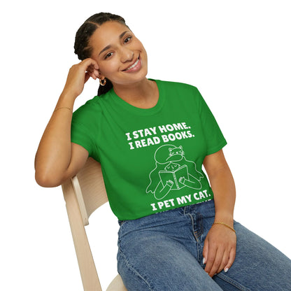 Cozy green tee featuring a fun illustration and text: 'I stay home. I read books. I pet my cat.' Perfect for cat-loving bookworms!