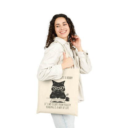 Reading Way of Life Tote Bag featuring a playful cat design on a durable cotton canvas, perfect for book lovers.