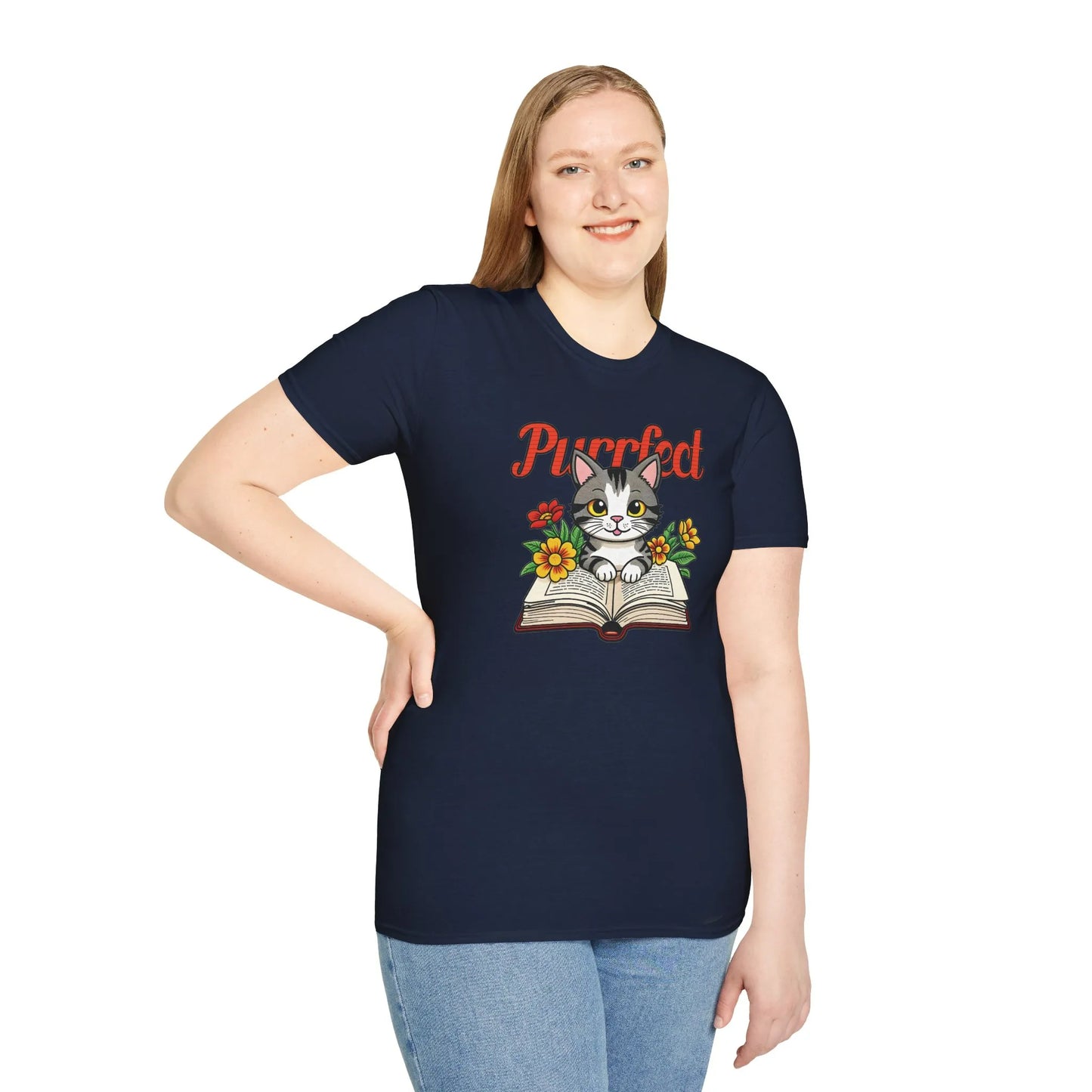 Purrfect Page T-Shirt with an adorable kitten on a book, perfect for readers. Relaxed fit unisex, organic cotton tee. 📖