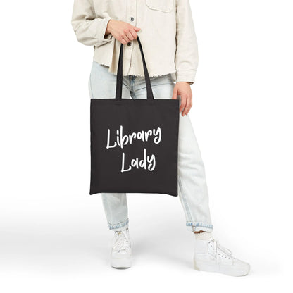 Library Lady Tote Bag in black with charming handwritten typography, perfect for book lovers and a great gift for readers.